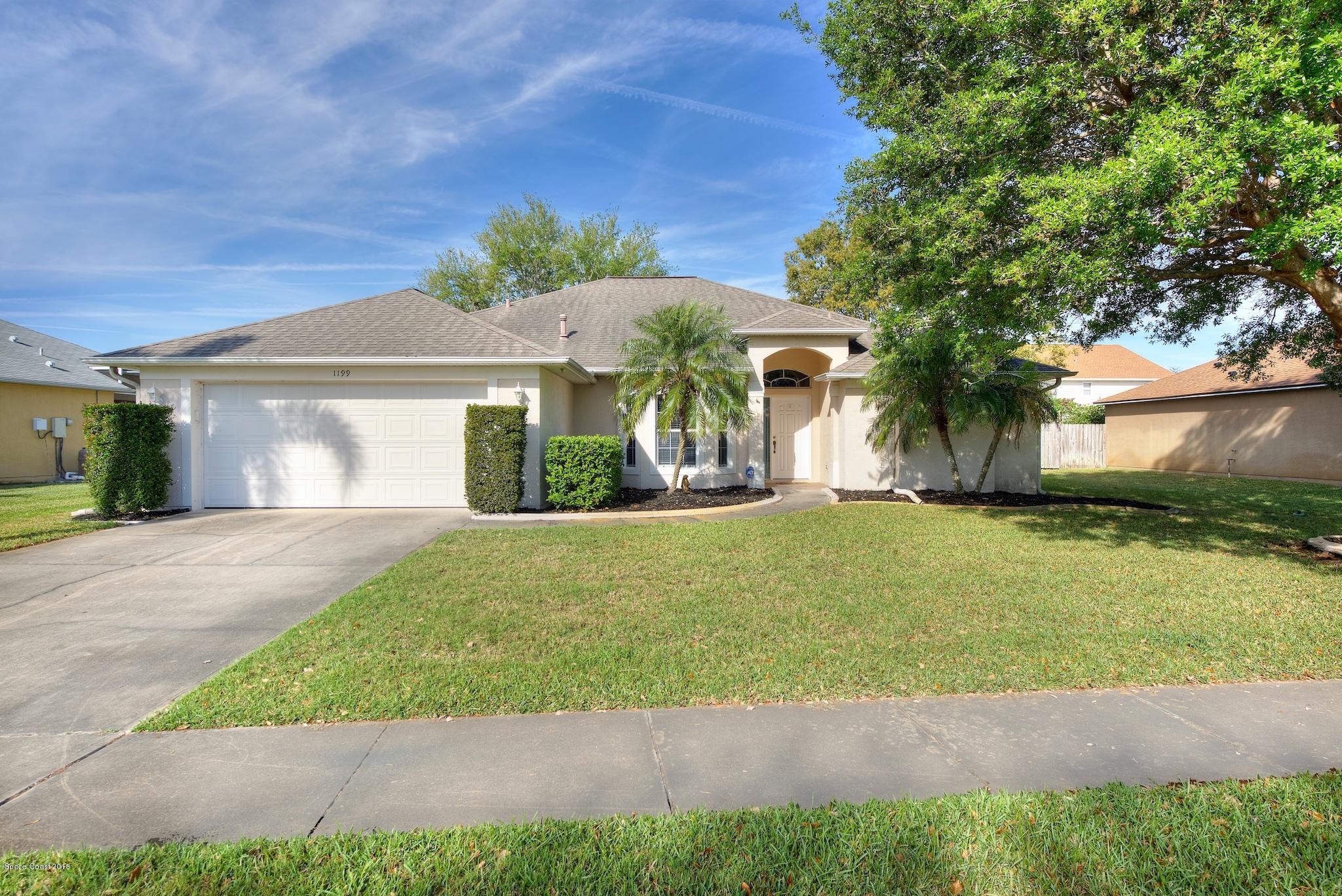 1199 Meadow Lake Road Rockledge, FL 32955 - Photo 1 of 21 Front 1
