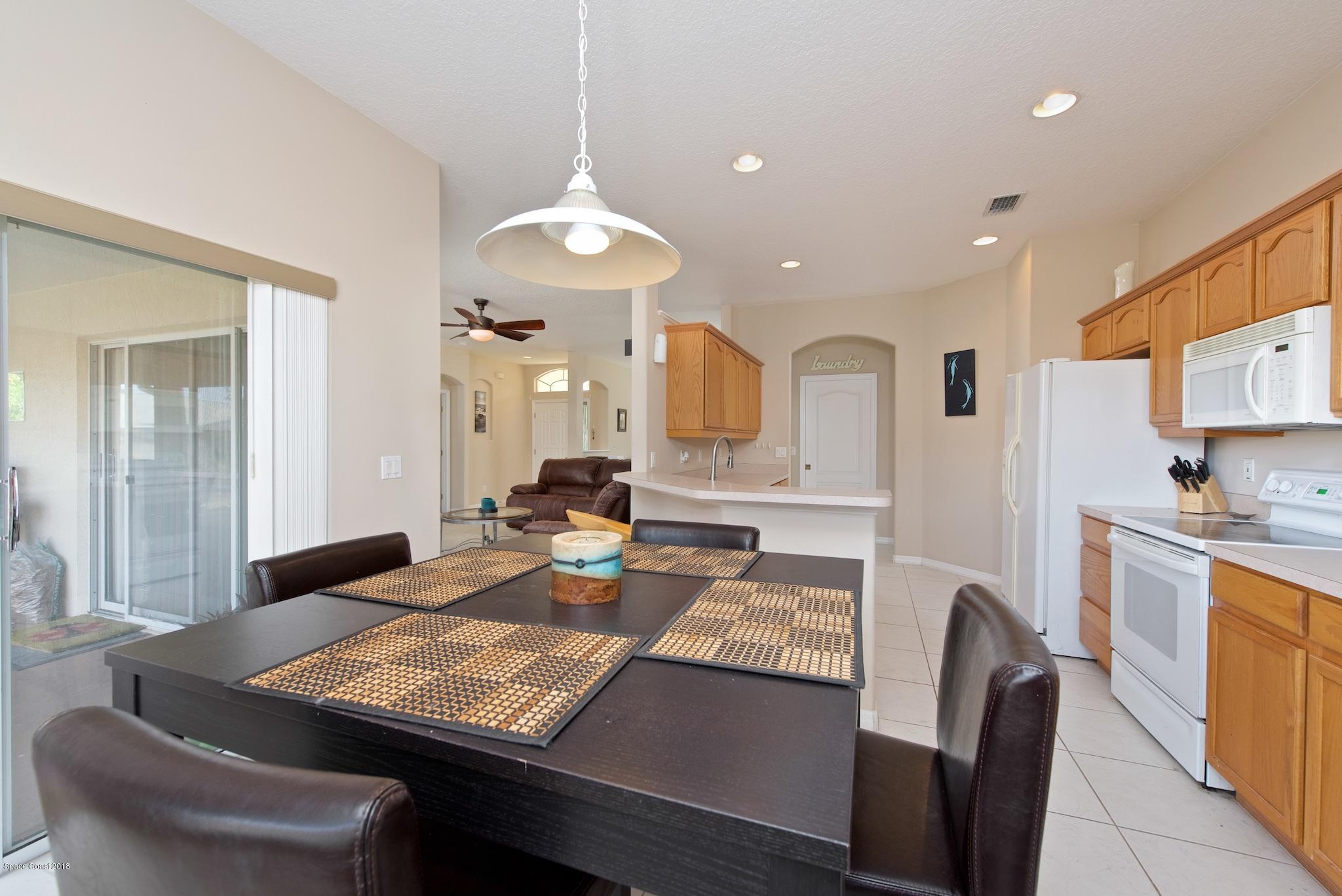 1199 Meadow Lake Road Rockledge, FL 32955 - Photo 11 of 21 Breakfast Room to Kitchen