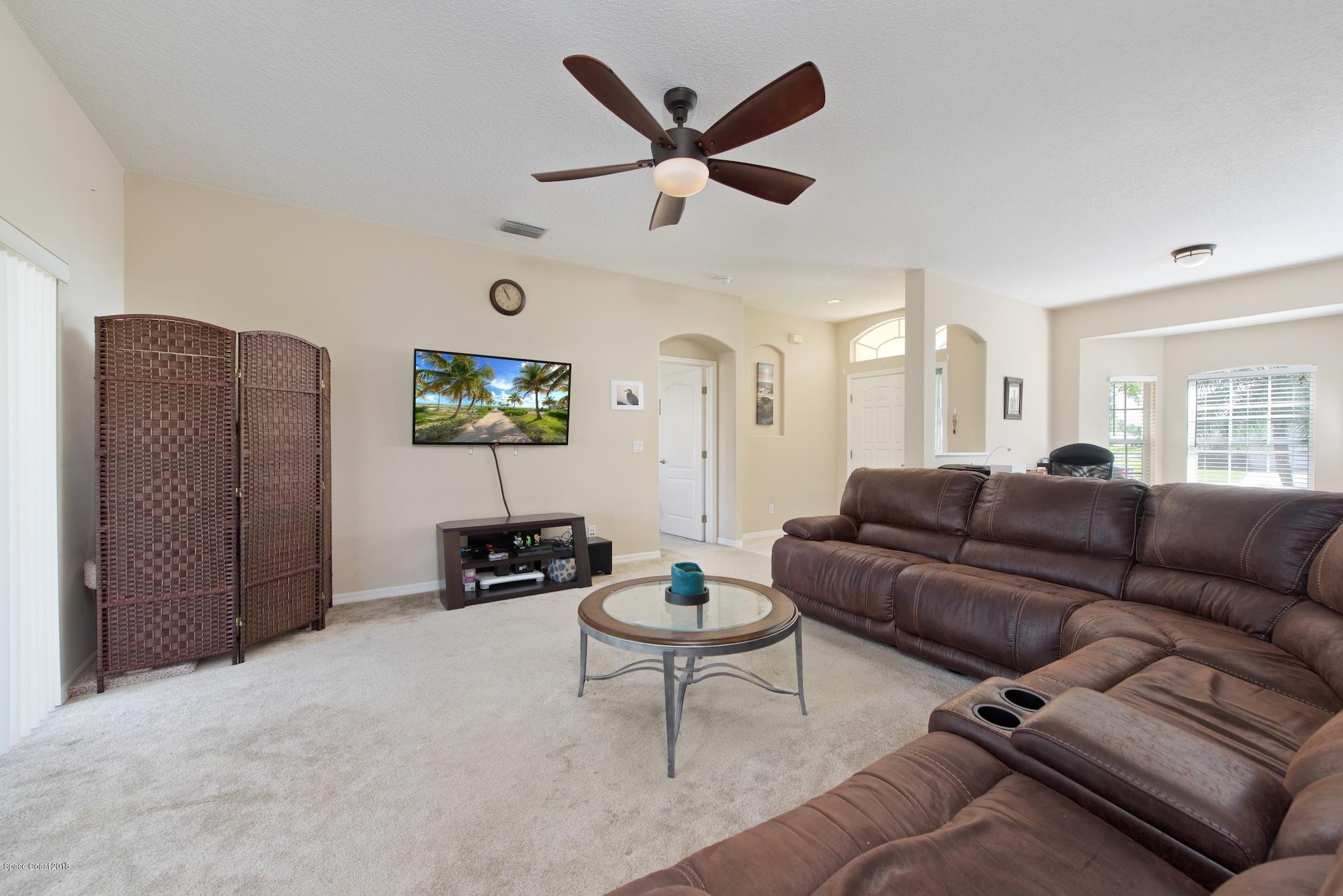 1199 Meadow Lake Road Rockledge, FL 32955 - Photo 3 of 21 Living Room 1