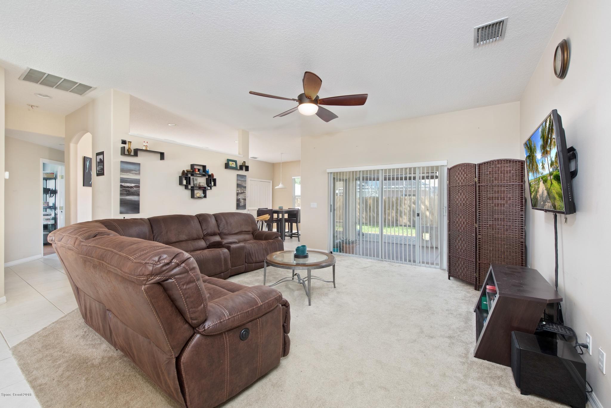 1199 Meadow Lake Road Rockledge, FL 32955 - Photo 4 of 21 Living Room 4