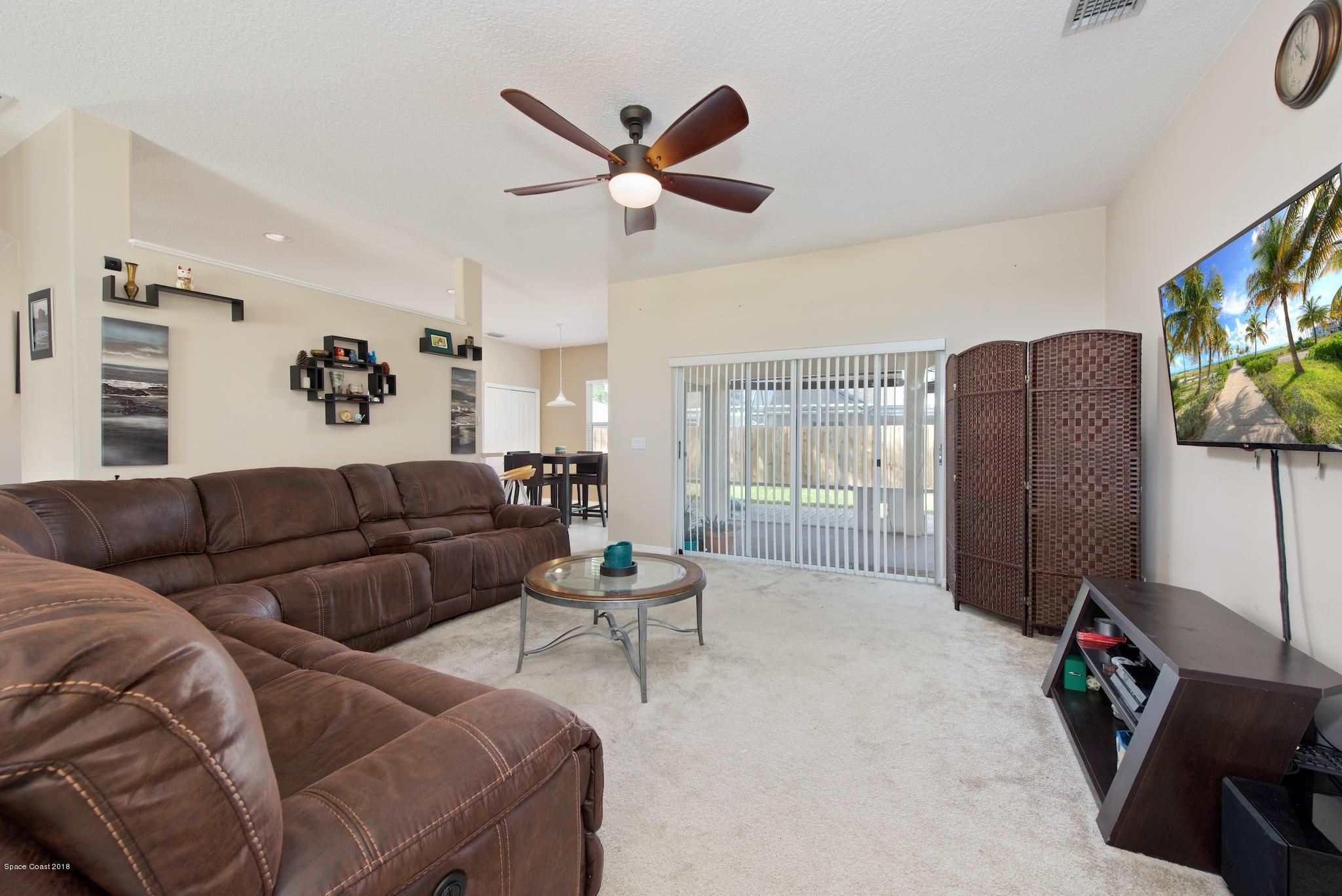 1199 Meadow Lake Road Rockledge, FL 32955 - Photo 5 of 21 Living Room 2