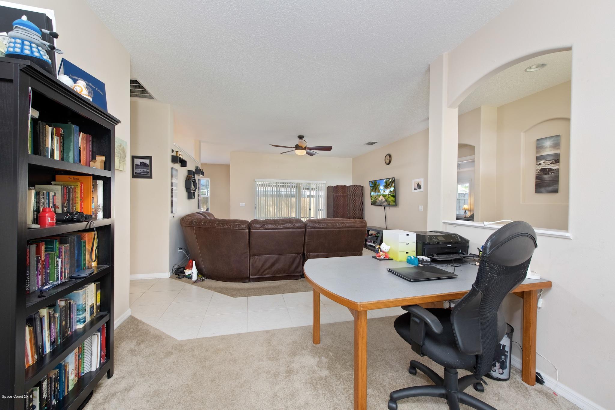 1199 Meadow Lake Road Rockledge, FL 32955 - Photo 6 of 21 Dining Room to Living Room