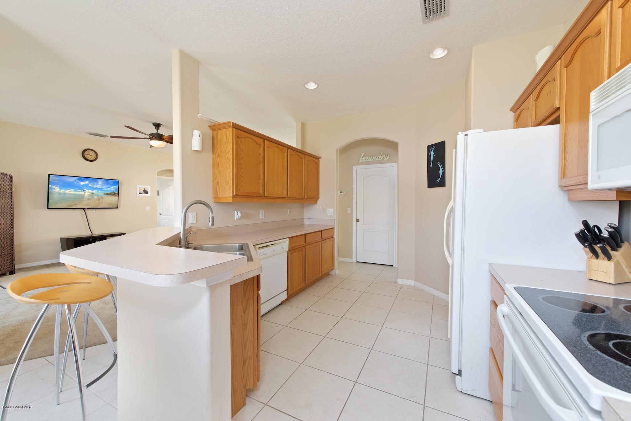 1199 Meadow Lake Road Rockledge, FL 32955 - Photo 8 of 21 Kitchen 2