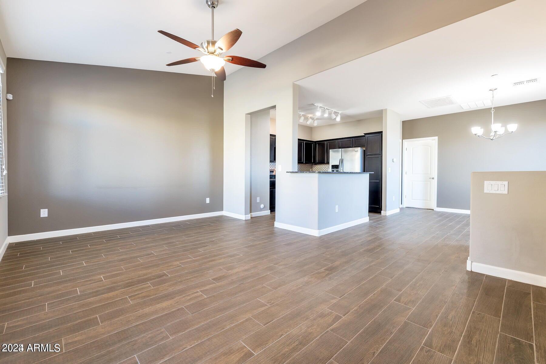 2150 West Alameda Road, Unit 1169 Phoenix, AZ 85085 - Photo 19 of 26 a view of a kitchen with a sink and a kitchen counter top space
