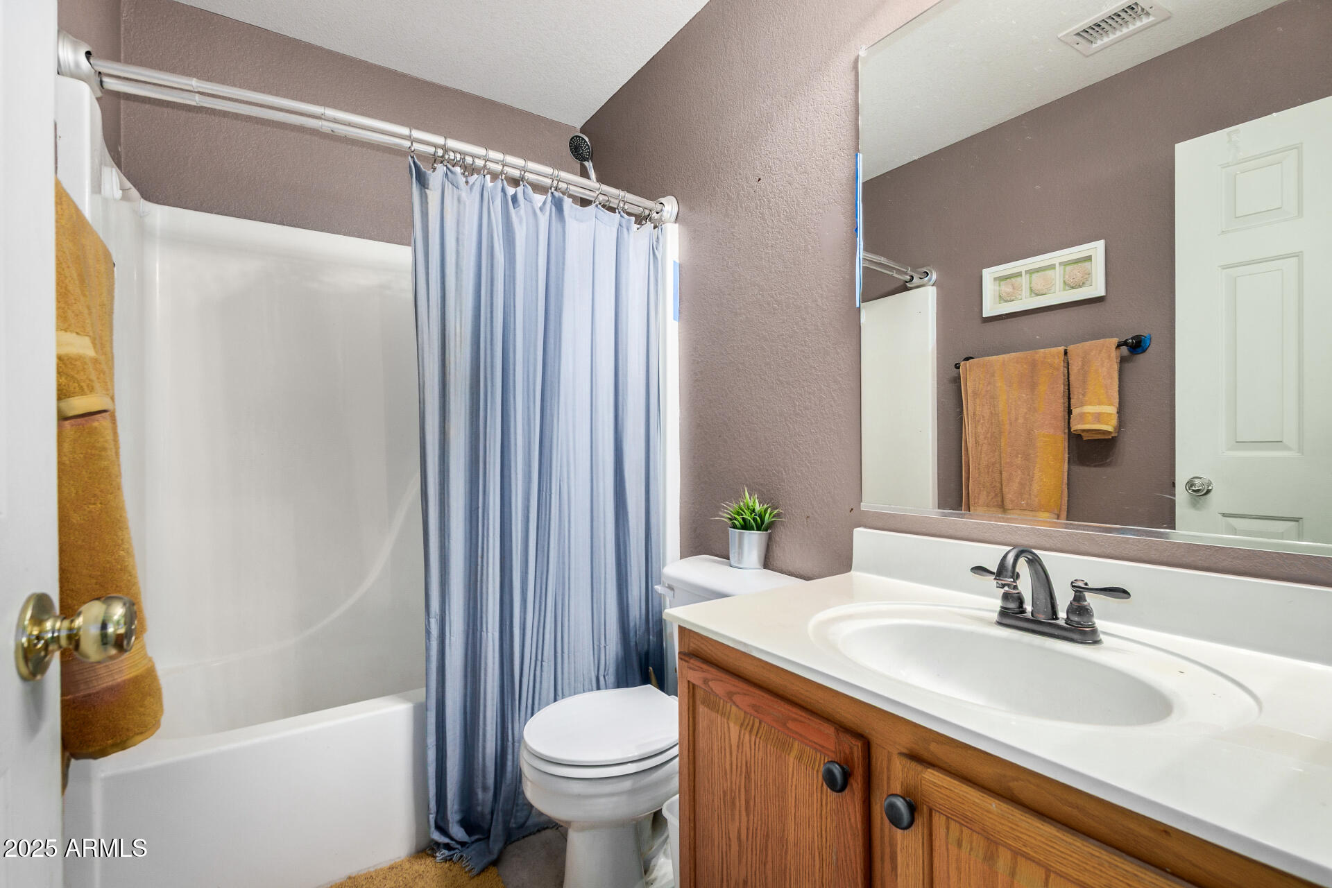 564 West Aviary Way Gilbert, AZ 85233 - Photo 18 of 29 a bathroom with a granite countertop sink toilet and shower