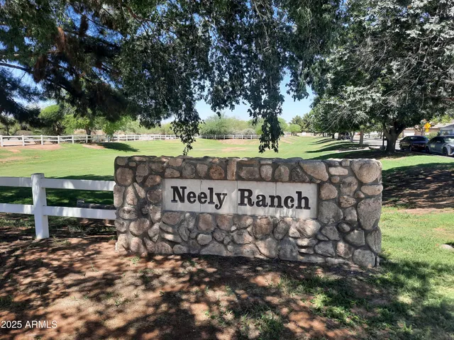 a view of outdoor space with garden and trees