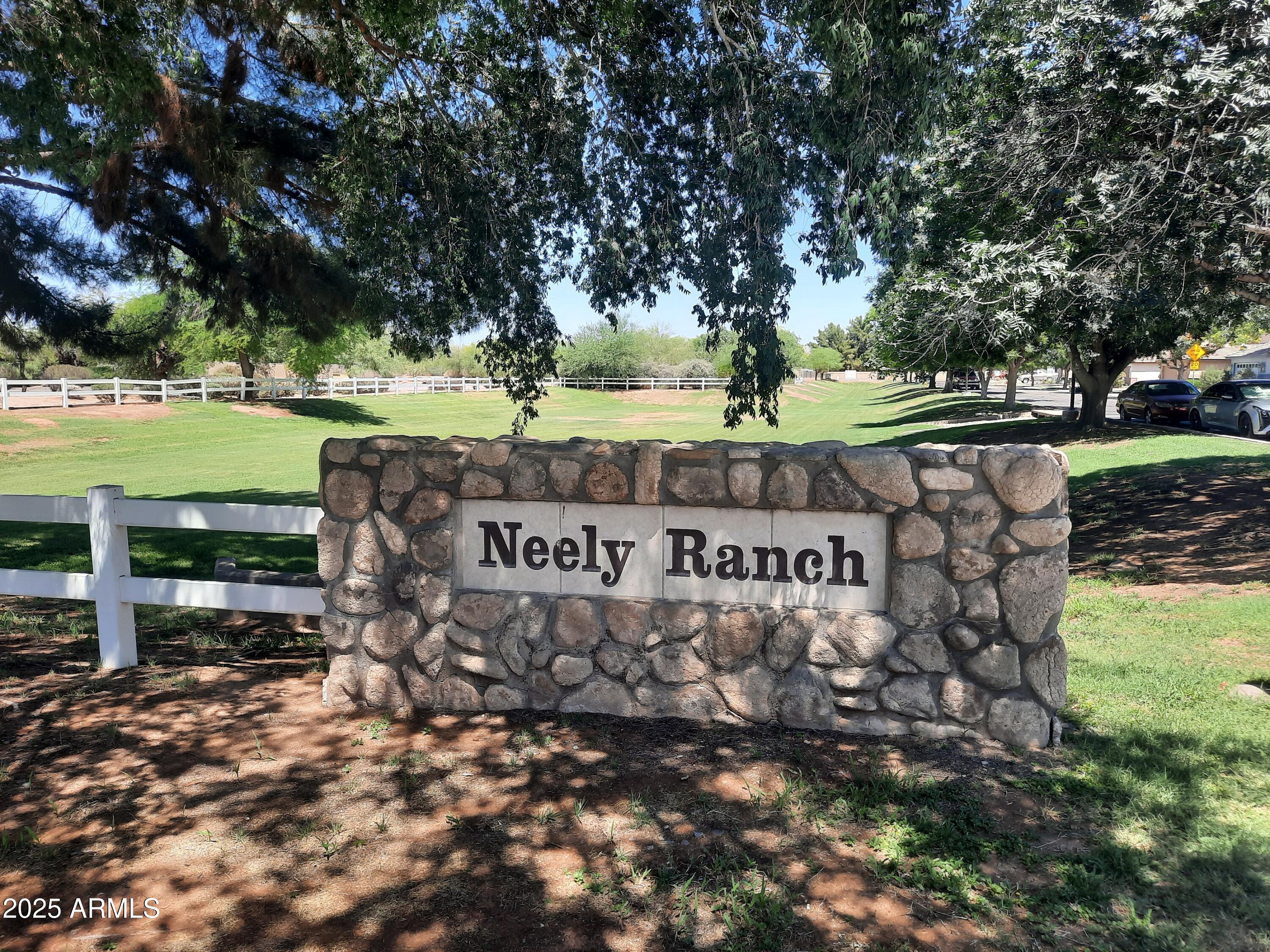 564 West Aviary Way Gilbert, AZ 85233 - Photo 23 of 29 a sign that is on the side of a road