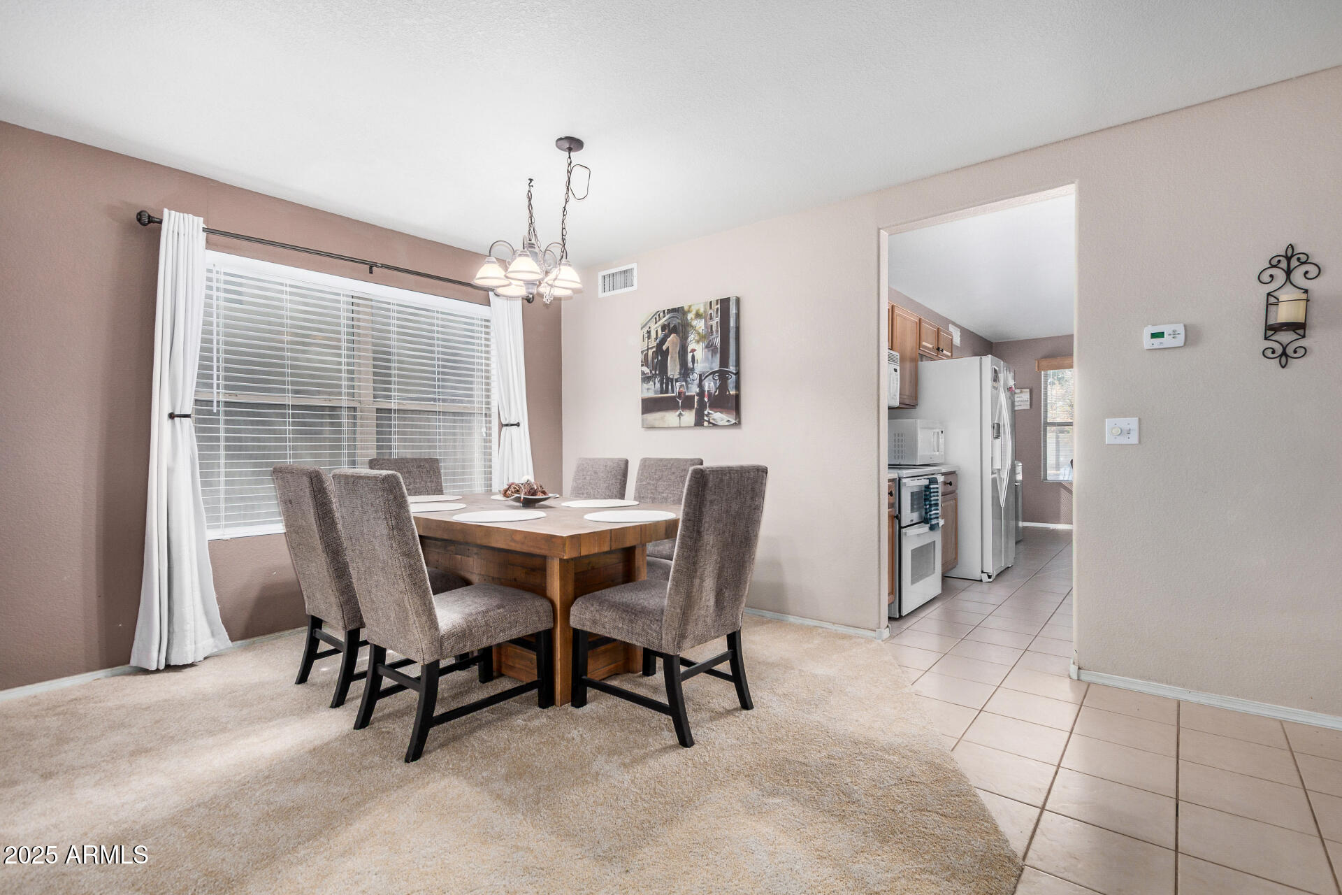 564 West Aviary Way Gilbert, AZ 85233 - Photo 6 of 29 a dining room with furniture and window