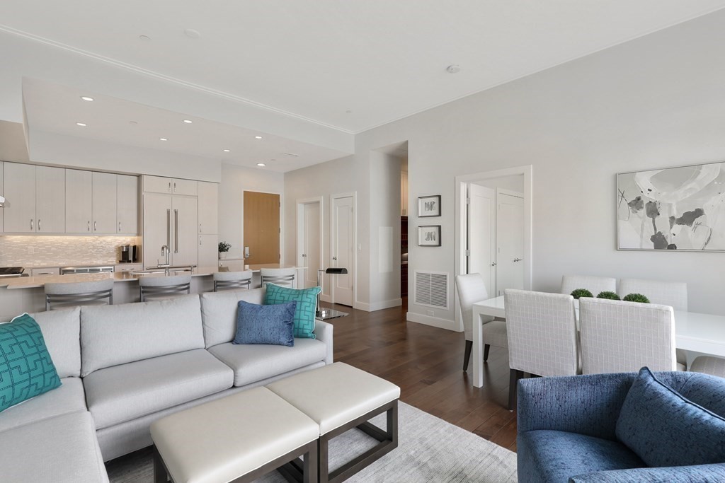 10 Shipyard Drive, Unit 510 Hingham, MA 02043 - Photo 14 of 40 a living room with furniture and a wooden floor