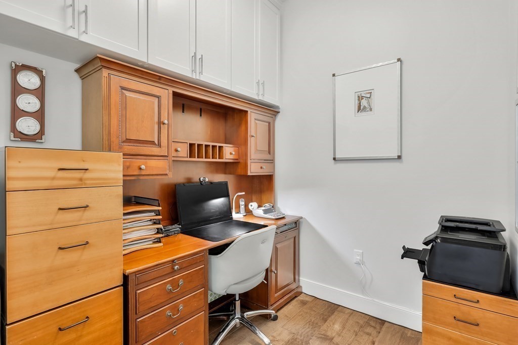 10 Shipyard Drive, Unit 510 Hingham, MA 02043 - Photo 33 of 40 a workspace with furniture and wooden floor