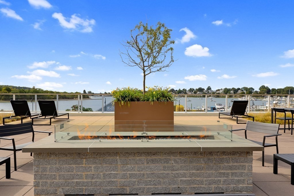 10 Shipyard Drive, Unit 510 Hingham, MA 02043 - Photo 39 of 40 a view of a swimming pool and lounge chair