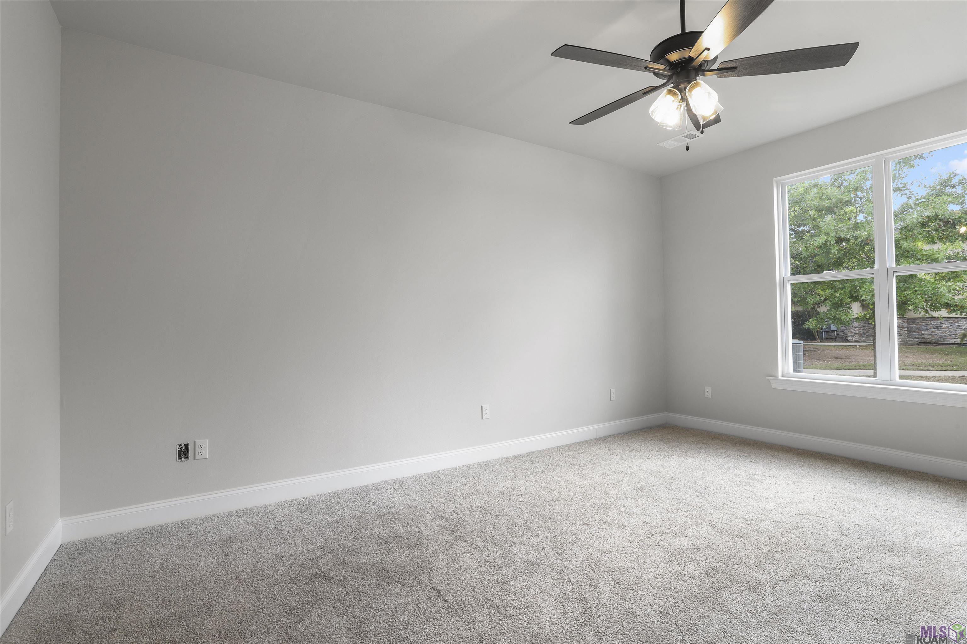 8722 Edgewater Drive Baton Rouge, LA 70820 - Photo 10 of 15 primary bedroom with view of lake