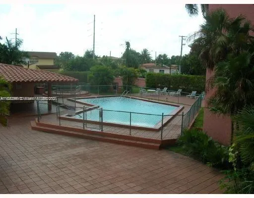 a room with gym equipment and a table