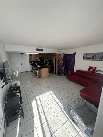 a kitchen with granite countertop stainless steel appliances and wooden cabinets