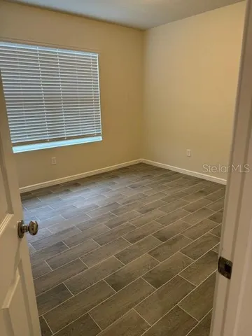an empty room with a bathroom
