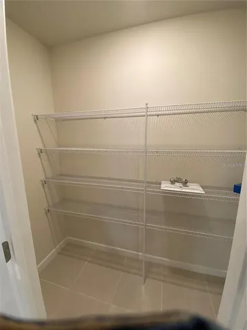 a bathroom with a sink a vanity and a mirror