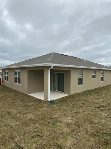 a view of building with yard