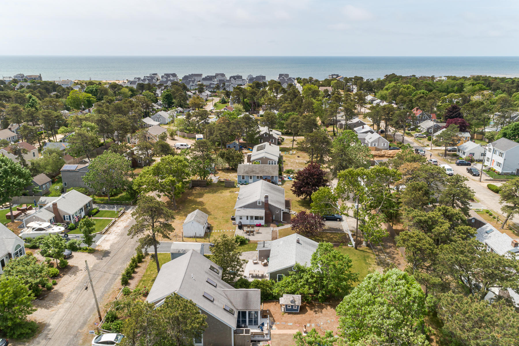 16 Edwards Road Dennis Port, MA 02639 - Photo 17 of 46 an aerial view of residential building with parking space