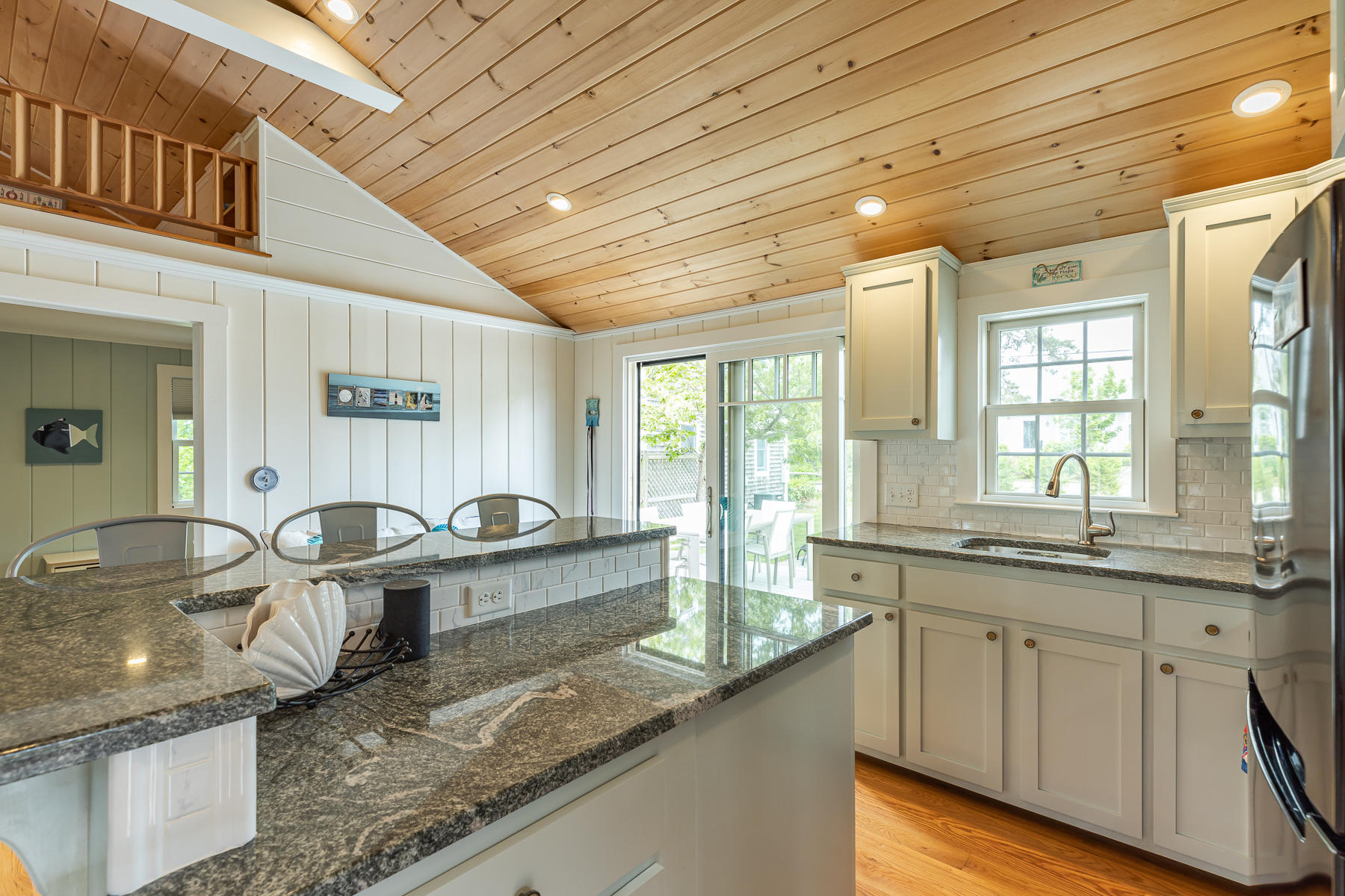 16 Edwards Road Dennis Port, MA 02639 - Photo 20 of 46 a large kitchen with granite countertop a sink and window