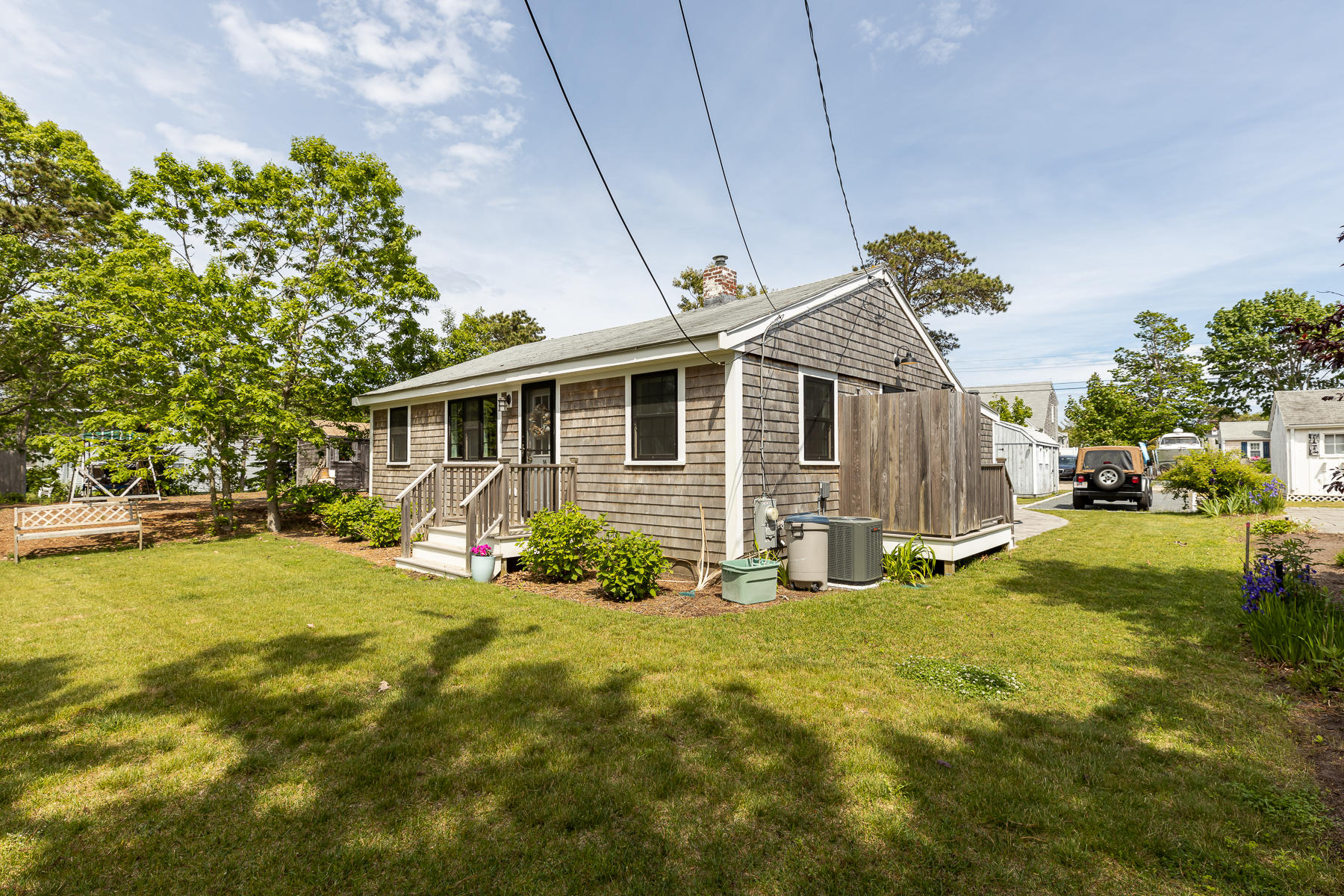 16 Edwards Road Dennis Port, MA 02639 - Photo 2 of 46 a view of a house with a yard