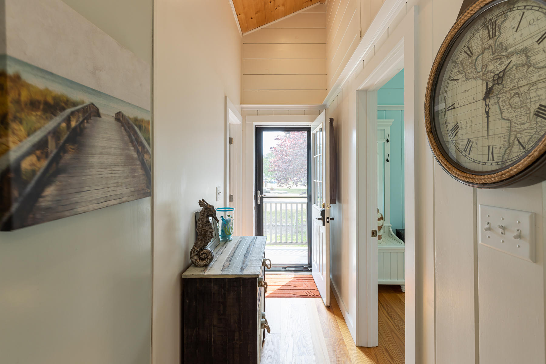 16 Edwards Road Dennis Port, MA 02639 - Photo 27 of 46 a view of a hallway with wooden floor and entryway