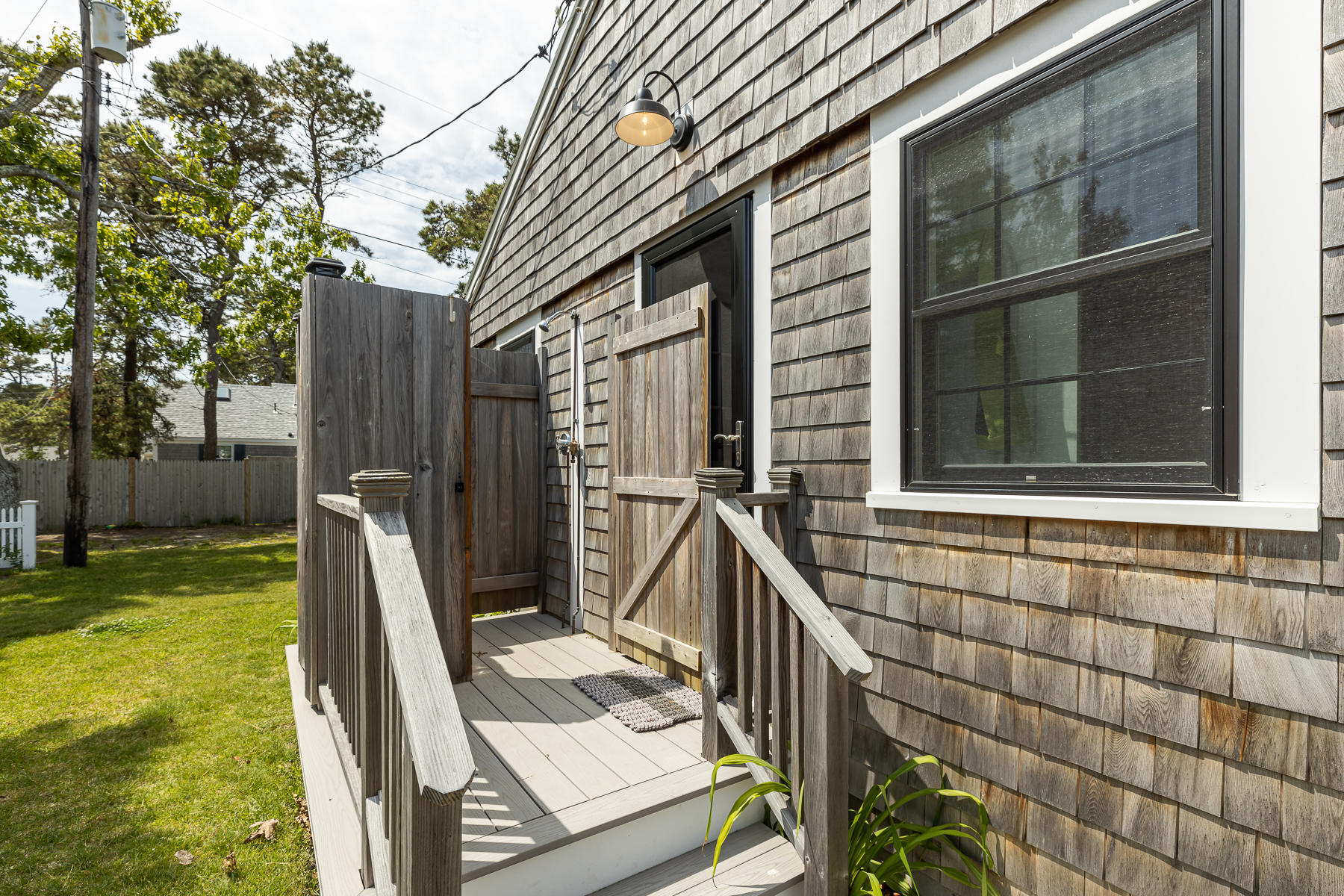 16 Edwards Road Dennis Port, MA 02639 - Photo 5 of 46 a view of a house with backyard and sitting area