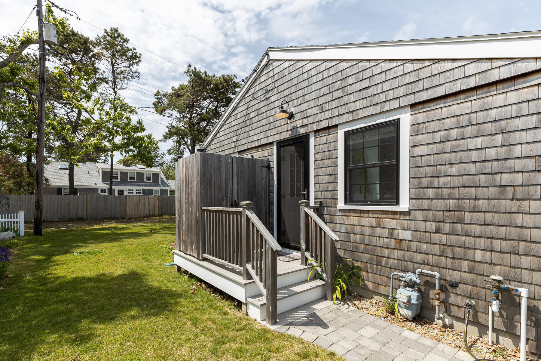 16 Edwards Road Dennis Port, MA 02639 - Photo 6 of 46 a view of a house with backyard and sitting area