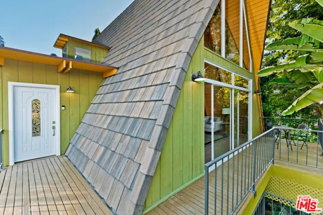 a bathroom with a stove and a shower