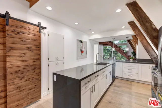 a view of a living room with furniture