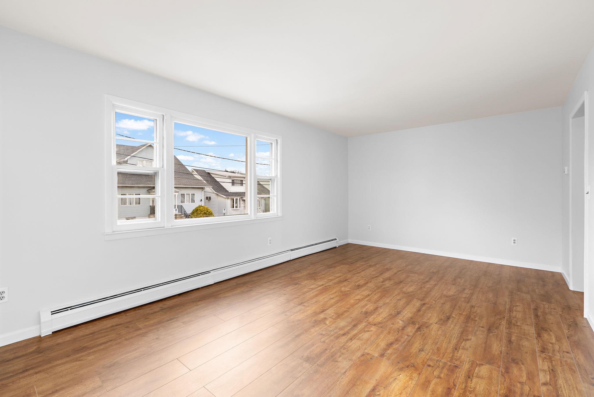 70 2nd Avenue, Unit 2 Secaucus, NJ 07094 - Photo 12 of 14 an empty room with window
