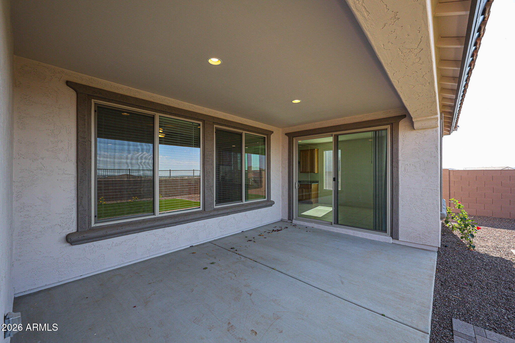 7023 West Plum Road Peoria, AZ 85383 - Photo 22 of 22 a view of an empty room with a sliding door