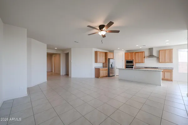 a view of a kitchen with furniture and a kitchen view