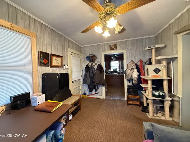 a room with furniture and a chandelier