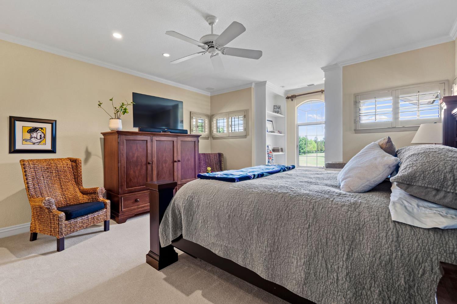 10676 Wilton Road Elk Grove, CA 95624 - Photo 52 of 71 a bedroom with a bed a couch and dresser