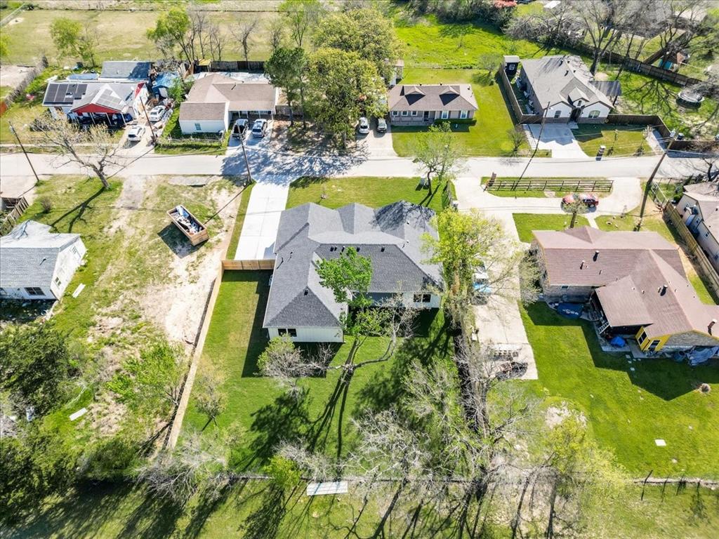 1507 Elk Creek Road Dallas, TX 75253 - Photo 38 of 40 an aerial view of residential houses with swimming pool