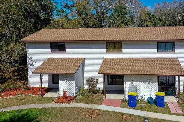 a aerial view of a house with entertaining space