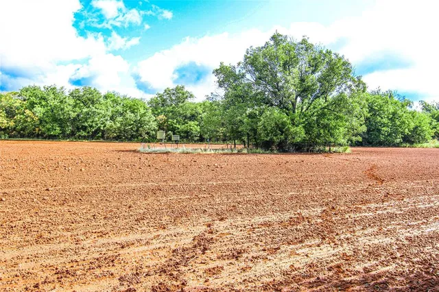 a view of a table and chairs in the patio