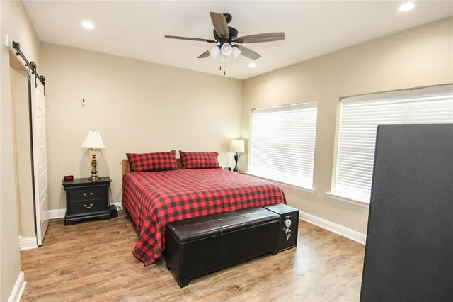 a bathroom with a double vanity sink a mirror and a shower