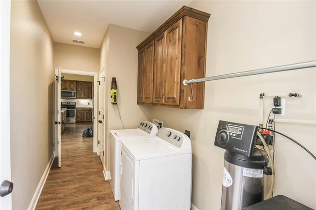 a swimming pool with outdoor seating and yard