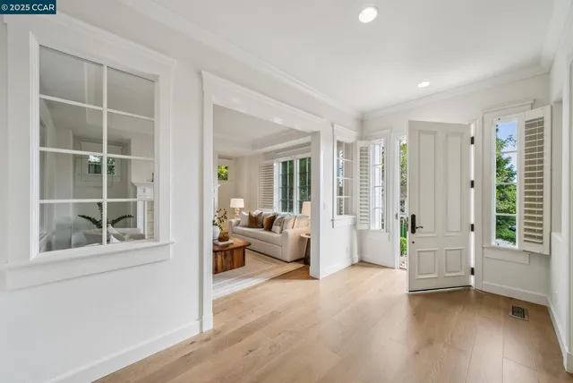 a living room with furniture and windows