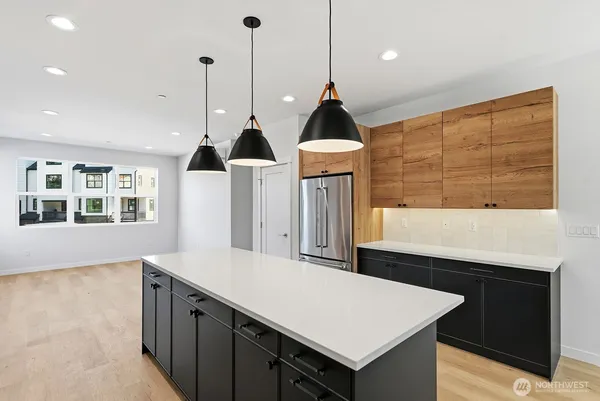 a view of kitchen with furniture and window