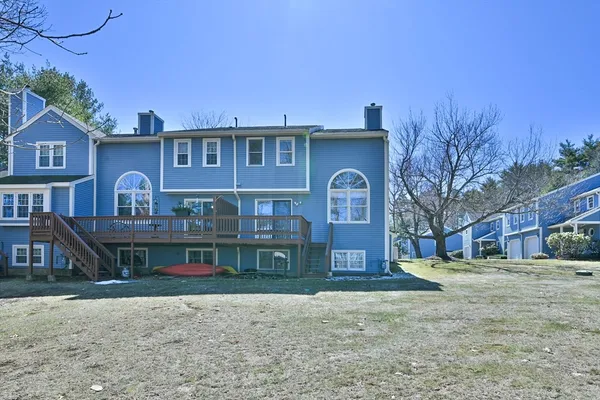 a kitchen with stainless steel appliances granite countertop a refrigerator sink and stove