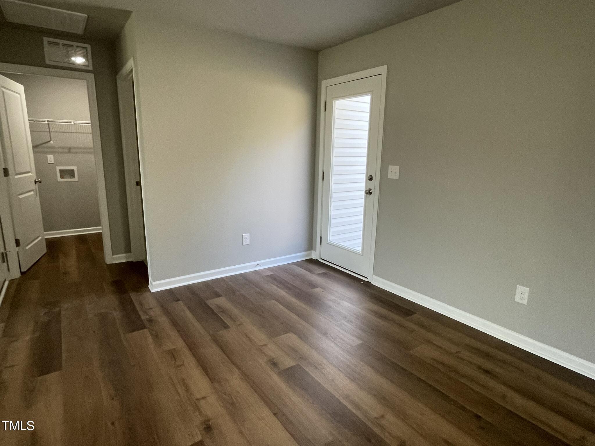 79 Tulipfield Way Benson, NC 27504 - Photo 5 of 19 wooden floor in an empty room