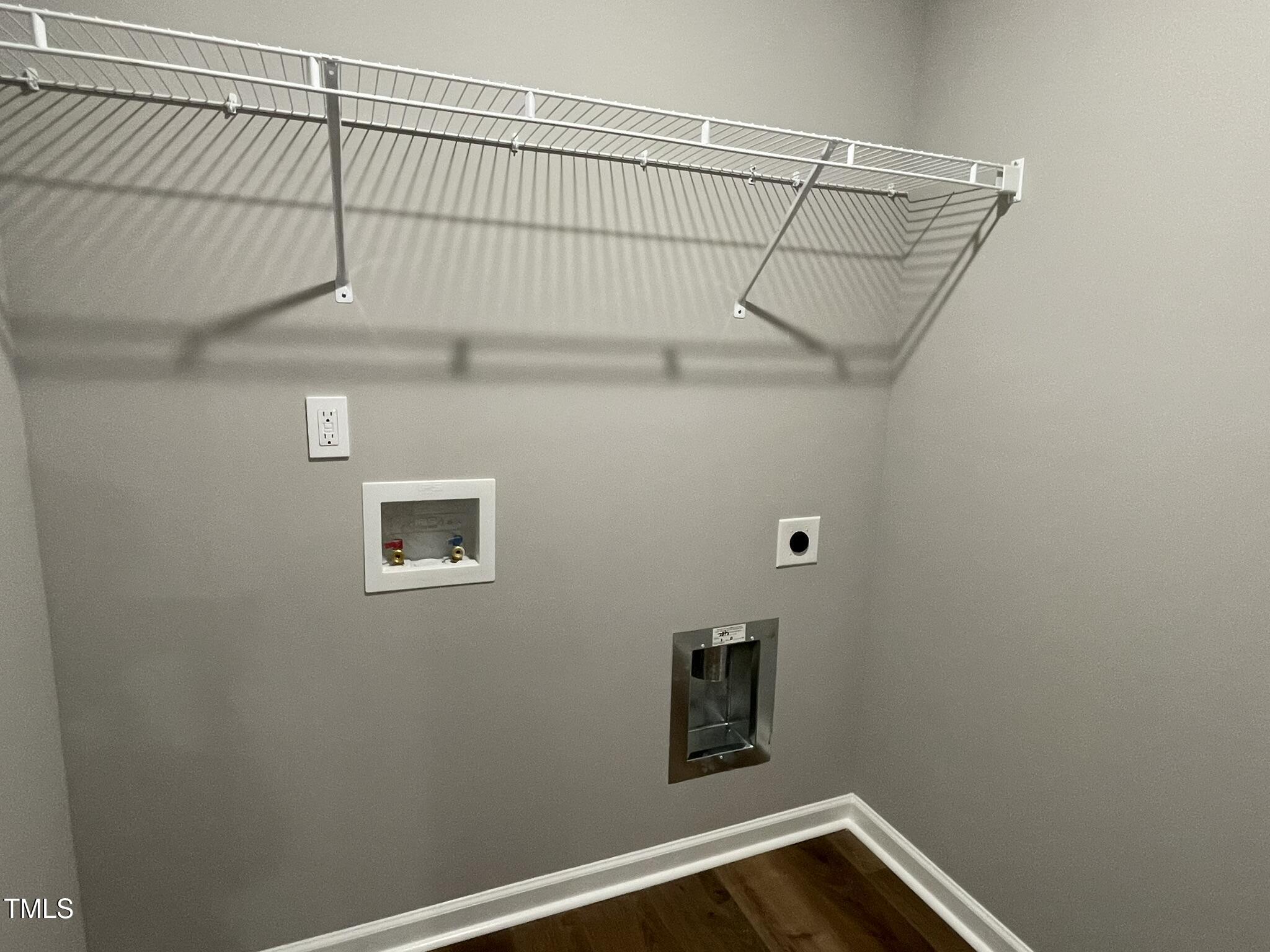 79 Tulipfield Way Benson, NC 27504 - Photo 10 of 19 a view of a room with rack on the wall