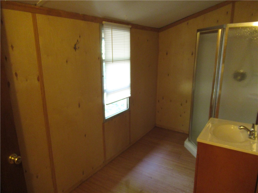 437 West Gate Road Pickens, SC 29671 - Photo 35 of 47 This functional bathroom features a shower and vanity with ample natural light.