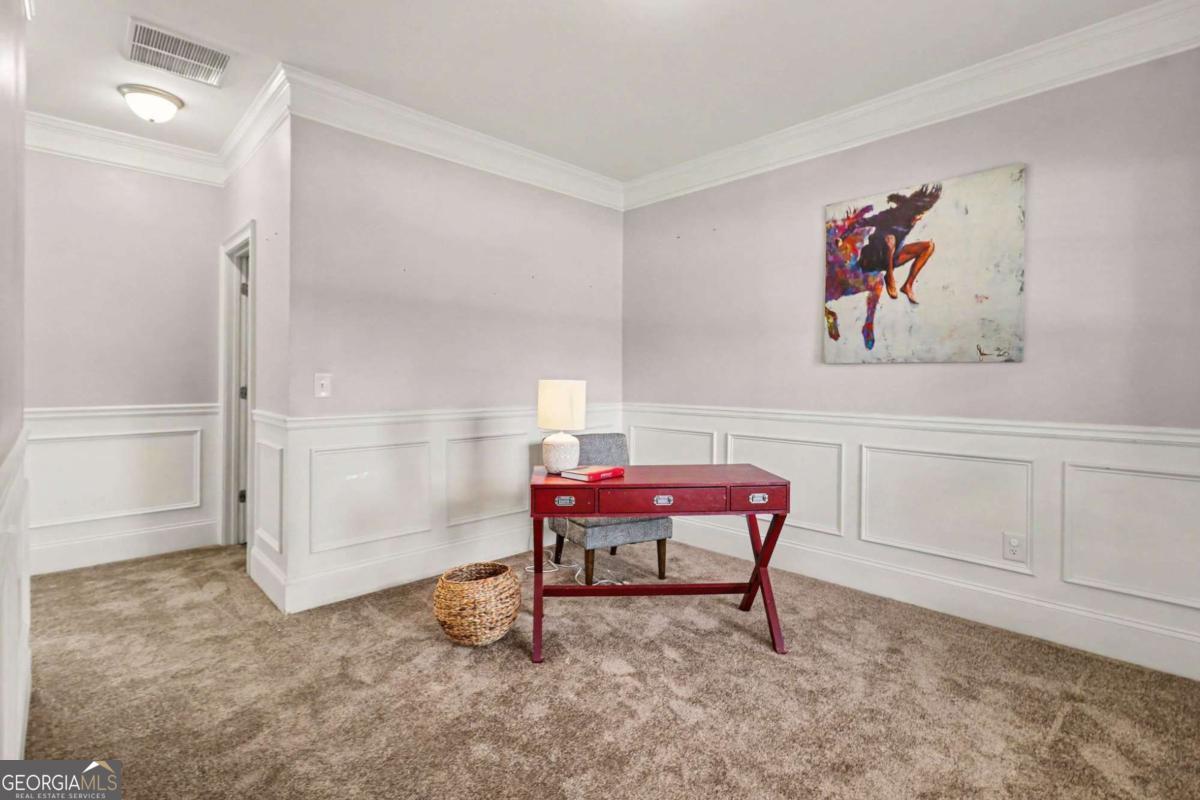207 George Wynn Road Palmetto, GA 30268 - Photo 10 of 32 a view of a room with furniture and closet