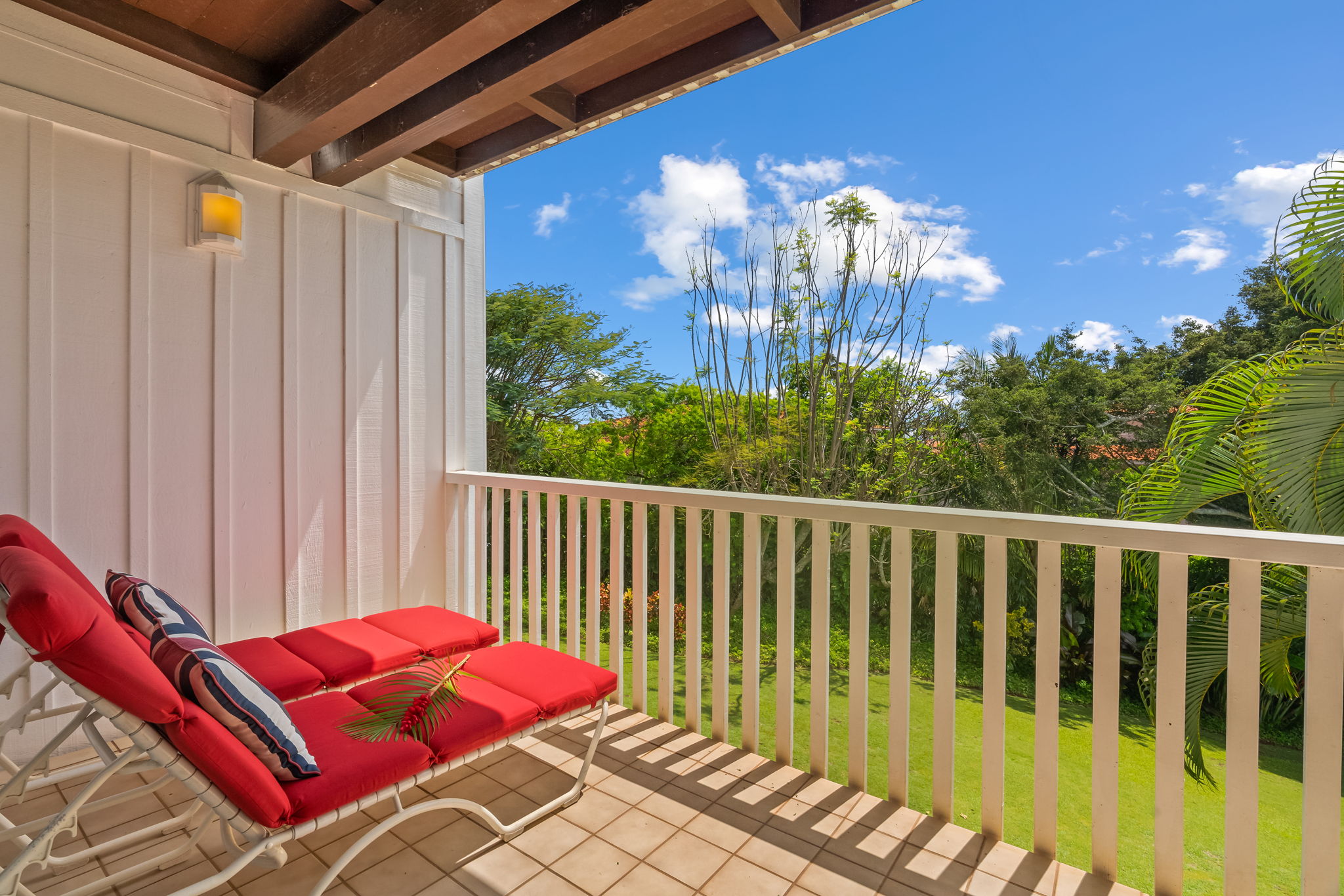 2253 Poipu Road, Unit 411 Koloa, HI 96756 - Photo 1 of 20 a view of a balcony with furniture
