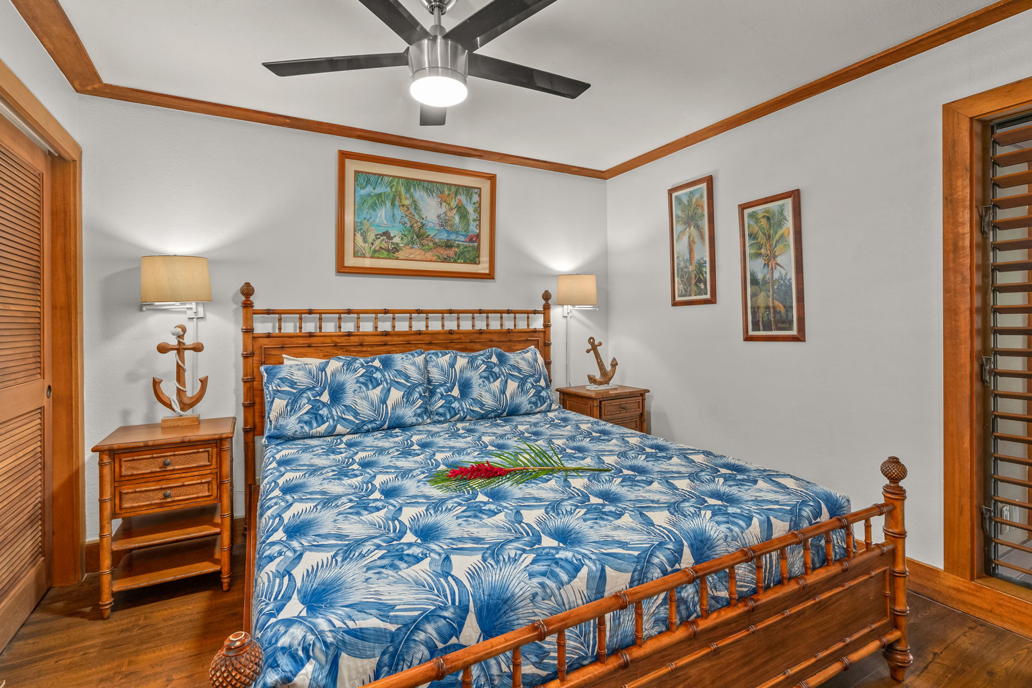 2253 Poipu Road, Unit 411 Koloa, HI 96756 - Photo 2 of 20 a bedroom with a bed and a dresser in it