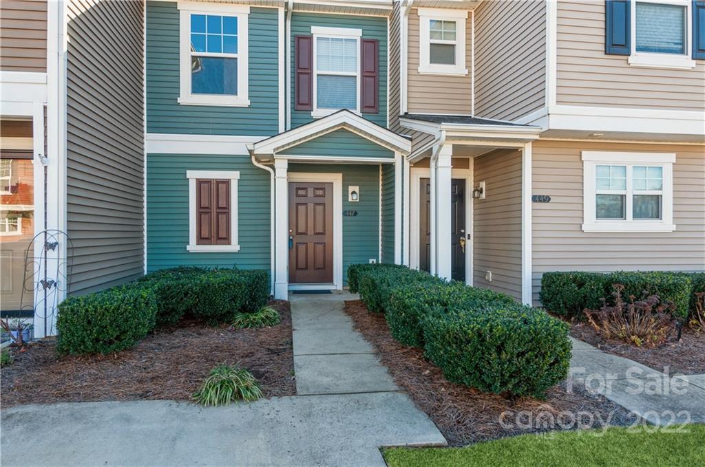 447 Hunters Dance Road, Unit 27 Fort Mill, SC 29708 - Photo 2 of 38 a front view of a house having yard