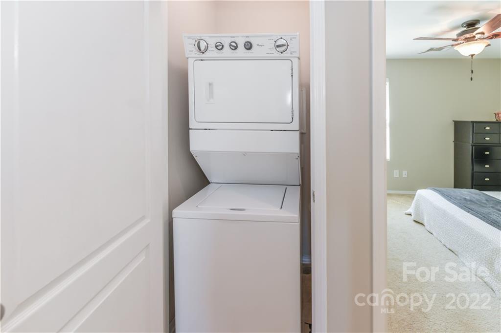 447 Hunters Dance Road, Unit 27 Fort Mill, SC 29708 - Photo 24 of 38 a utility room with dryer and washer